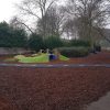 Playground in-ground mound tunnel landscape view