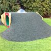 Playground in-ground mound tunnel with rubber safety surfacing