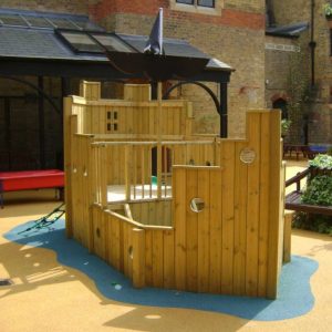 Playground Pirate Ship timber deck and porthole panels on safety surfacing