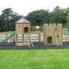 Wide view of Hazelgrove double adventure play area with rubber grass mats