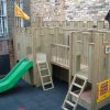 Mars Montessori timber fort with open slide and ladder access
