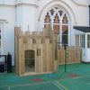 Old Vicarage compact play fort with firepole and coloured safety surfacing