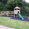 Playground Lookout timber play structure with bridge and slide