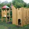 Woodchester School castle play structure with climbing panels