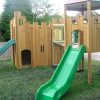Woodchester School slide and castle view of timber adventure play structure