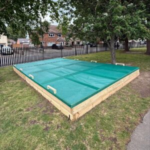 Bespoke 7x4m timber sandpit with sectional covers