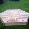 Jumbo hex sandpit with slatted cover main view