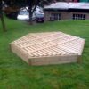 Jumbo hex sandpit side view with slatted cover