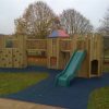 Timber play towers and slide at Elsenham
