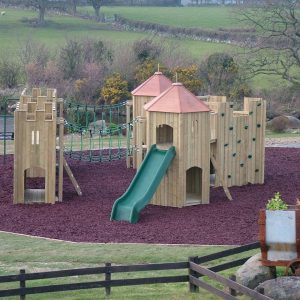 Gypsy Wood multi adventure play area with timber towers, slide and rubber mulch surfacing
