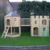 Front view of Hampton timber adventure play towers and bridge