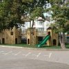 Oakdale multi adventure play area with timber castle and slide