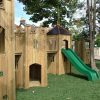 Oakdale castle towers with slide and loose rubber mulch