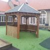 Playground gazebo shelter with covered seating