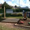 School shade sail providing cover in a playground