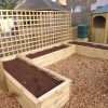 Belleville School planters and hardwood chippings view