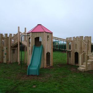 Downes Combo timber multi adventure play structure with slide, tower and gatehouse