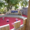 Mont A L'Abbe bespoke courtyard play area with colourful surfacing