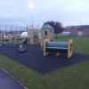 Playground above ground tunnel in play area