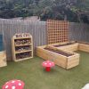 The Oval Primary School bug city planters mushroom seats and sensory garden features