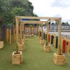 The Oval Primary School free form posts and rainbow fencing in sensory play area