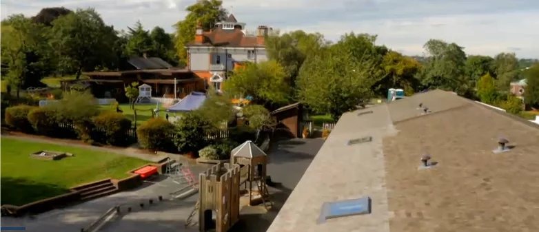 Aerial view of the Secret Life playground with the double adventure play structure