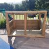 Four Acres Academy timber shelter in school play space