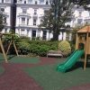 Pembridge Square Garden communal garden playground with tower slide swings spinner and safety surfacing