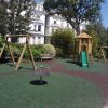Pembridge Square Garden landscaped play area with tower swings spinner and safety surfacing