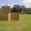 Rear view of wooden multi-use goals with basketball hoop