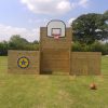 Wooden playground goal with basketball hoop and ball target panel