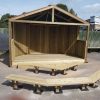 Croft timber stage with curved benches