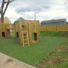 HPB Lucker Hall double adventure play towers with ladders and climbing access