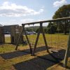 Walford Village Hall double swing frame with grass safety matting side view