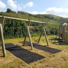 Walford Village Hall double swings with tower and turret play structure