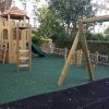 Princes Square Garden communal garden playground with tower swings balance play and safety surfacing