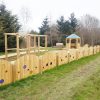 Lyppard Grange complete playground service with outdoor retreat rainbow fencing arch and timber play features