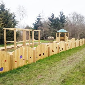Lyppard Grange complete playground service with outdoor retreat rainbow fencing arch and timber play features