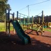 Old Downs clamberstack with tower slide and bonded rubber mulch surfacing