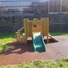 Old Downs toddler tower with slide ramp steps and bonded rubber mulch surfacing