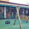 Commercial Flats Bristol two-bay swing frame on coloured wet-pour surfacing