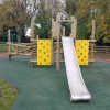 Down Road play tower with slide and climbing panels