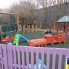 Sutherland Quarters motion play area with spring rocker balance play and timber shelter