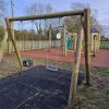 Brockley Play Area swing frame with tower slide and rubber mulch play area