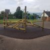 Clamber stack installation on safety surfacing