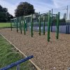 Side view of green playground play frame route