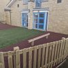 St Marys Quiet Area entrance with artificial grass, rubber mulch and timber fence