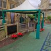 Stroud Valley EY sheltered outdoor learning area with mushroom seats and play markings