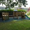 Thrupp adventure play structure in landscaped school grounds