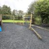 Avondale activity trail balance beam beside school play area